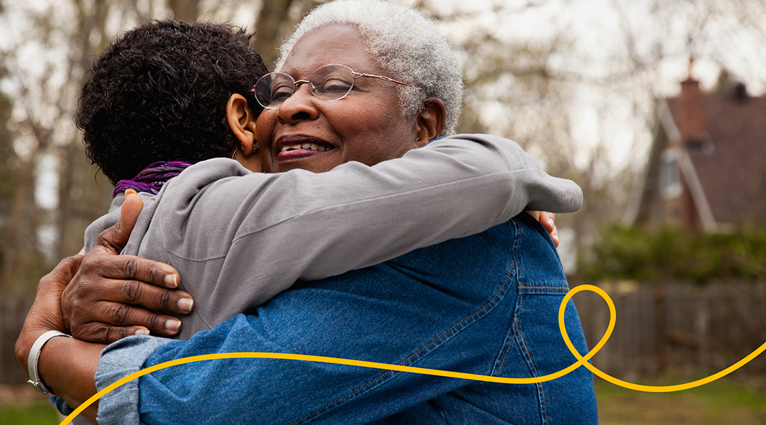 Two people hugging